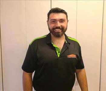 Male tech posing black shirt and beard