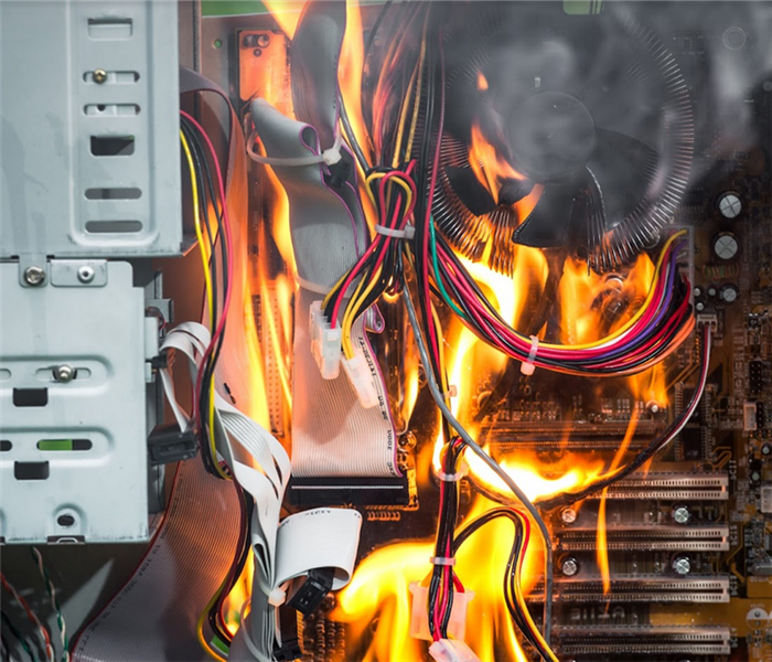 a fire raging on some kid of circuit board