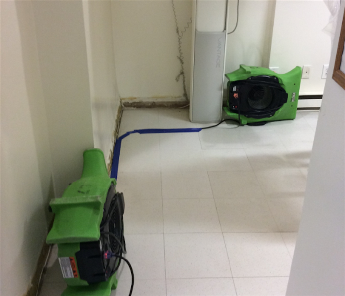 Equipment in office building drying water damage